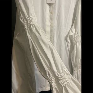 Crisp white button down with a modern puff sleeve